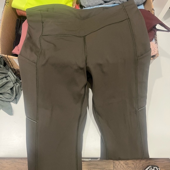size six olive green lululemon leggings side and waste and pocket - Picture 2 of 4